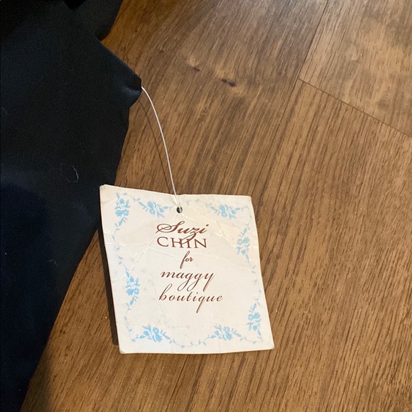 Black Sleeveless Ruffle Dress - Picture 3 of 6